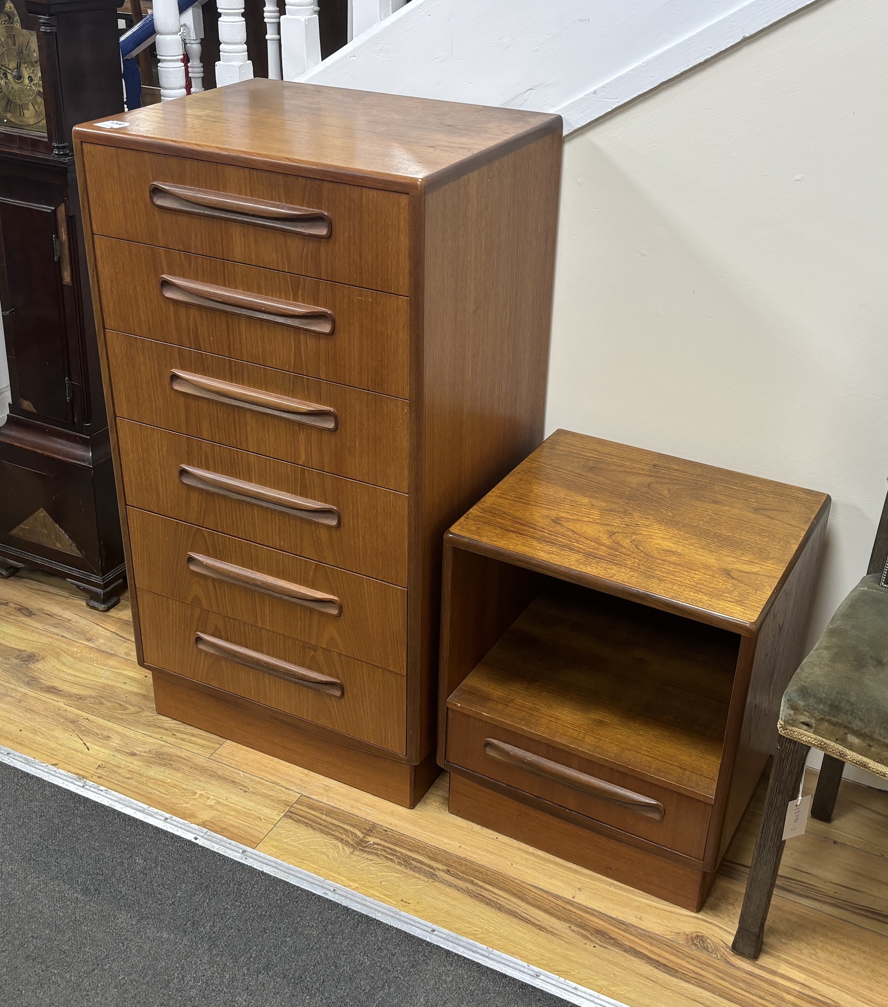 A mid century G Plan Fresco teak six drawer narrow chest, width 55cm, depth 44cm, height 103cm together with a matching bedside cabinet
